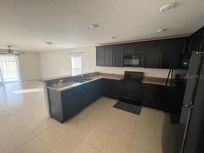 Photo - 6909 Crested Orchid Dr