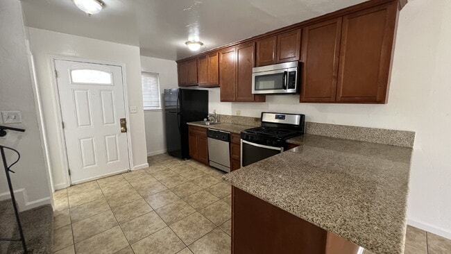 Photo - NO RENT DUE FOR DECEMBER - Updated interior - must see!  Parking On Site - Laundry On Site Unidad D