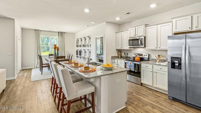 Photo - LOTS AMENITIES AND COUNTRY LIVING!