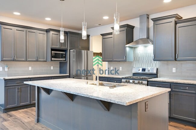 Photo - Stunning 3 Beds and 3 Bath Single Family with additional office space and entertainment room read...