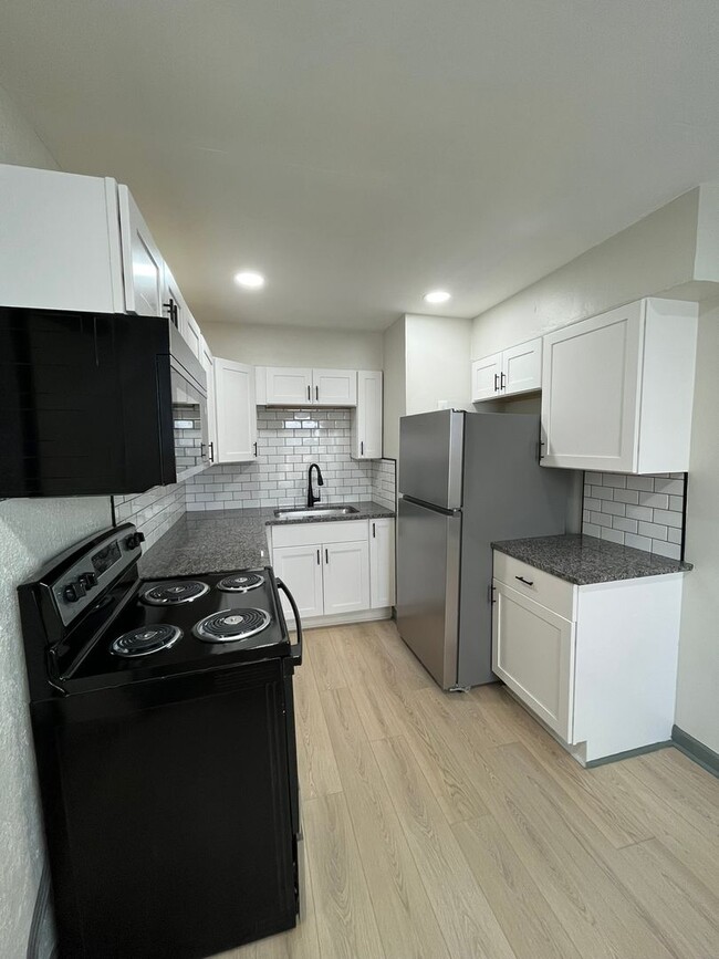 Photo - Beautifully Renovated 3BR Home with Modern Finishes & Spacious Living Areas