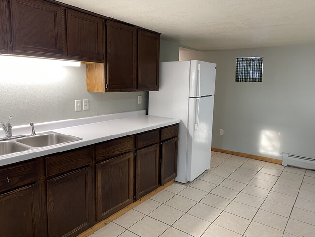 AVAILABLE JUNE - Unit 3 - Garden Apt - 1210 E 2nd St Unit 3