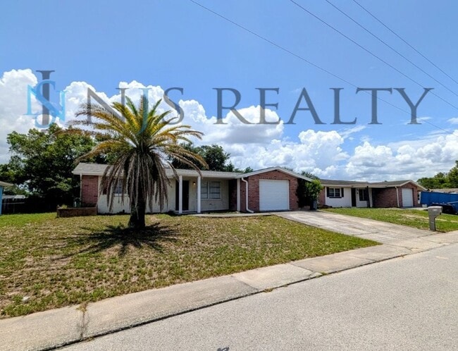 Photo - True 3 Bed~2 Bath~with garage. Over 1,000 sq ft, with updated kitchen & bathrooms, large open liv...