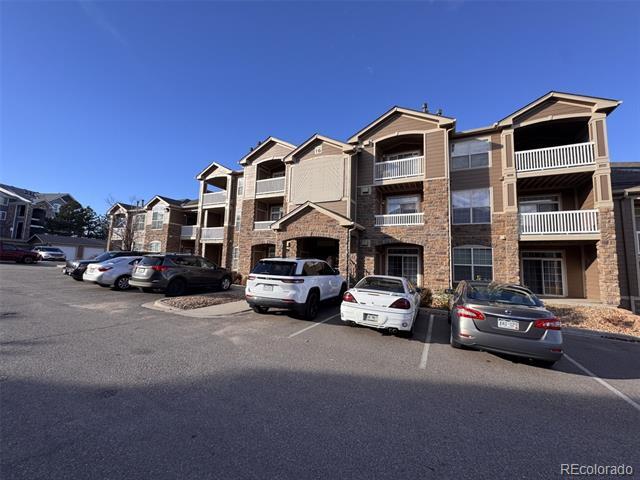 Building Photo - 7440 S Blackhawk St Unit 204