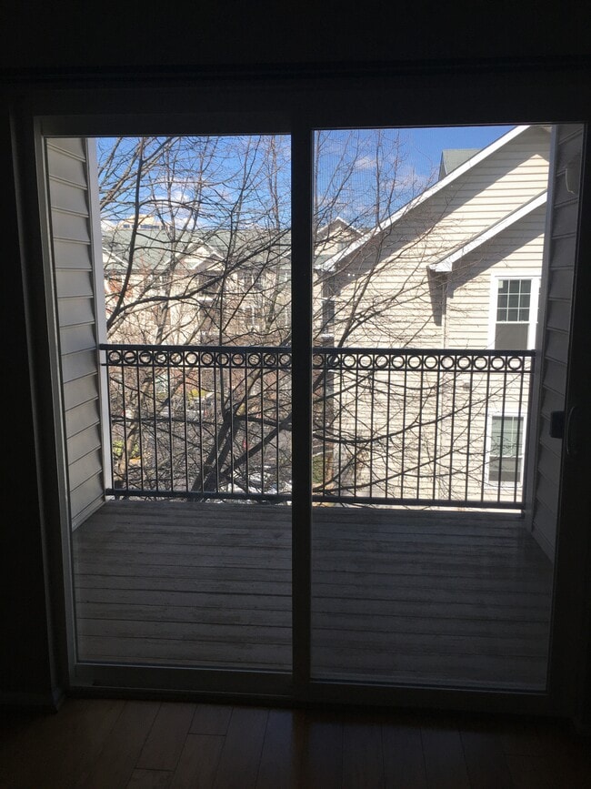 view of balcony from inside the unit - 1591 Spring Gate Dr Unit 3413