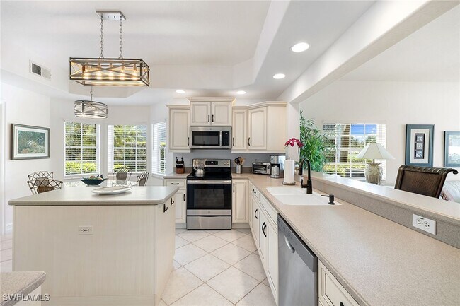 Building Photo - 8177 Saratoga Dr Unit 1001