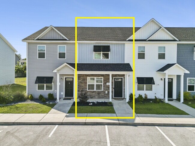 Photo - Available Now! Enjoy low-maintenance coastal living in this beautiful 2-bedroom, 2.5-bath townhom...
