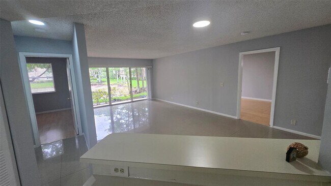 Photo - 9055 Wiles Rd Unit 5-106