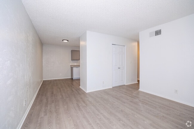 2BR, 1BA - 719SF - Living and Dining Area