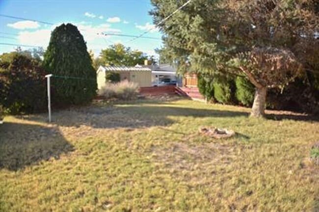 Photo - Updated house with original hardwoods and 2-car garage!