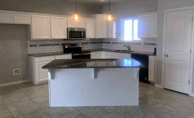 Photo - Stylish Open-Floor-Plan Home Up Off Hualapai Mtn Rd with Three-Car Garage