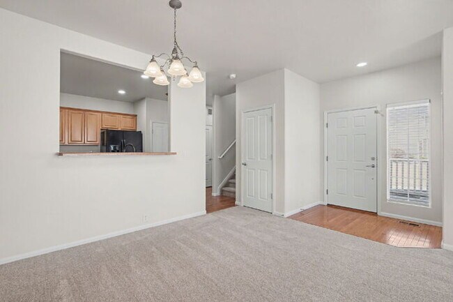 Photo - Beautifully Updated 3-Bedroom End-Unit Townhome Facing Open Space with Attached 2-Car Garage in G...