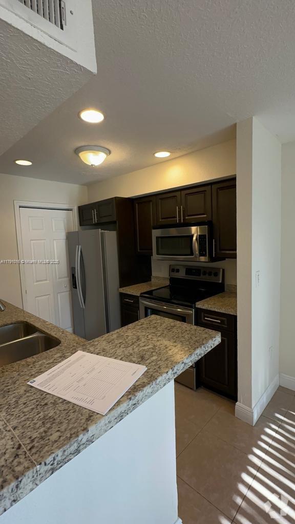 Building Photo - 2341 NW 44th St Unit 404 Rental