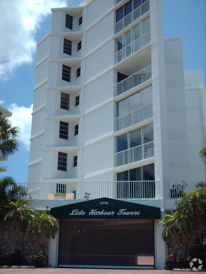 View of east exterior from Ben Franklin Drive - Lido Harbour Towers Apartments