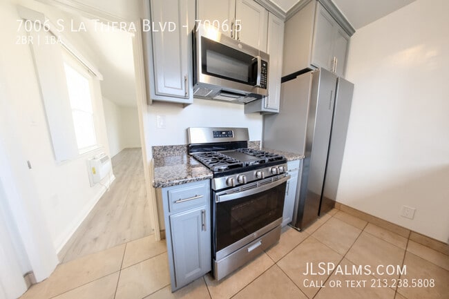 Building Photo - 7006 S La Tijera Blvd Unit 7006.5