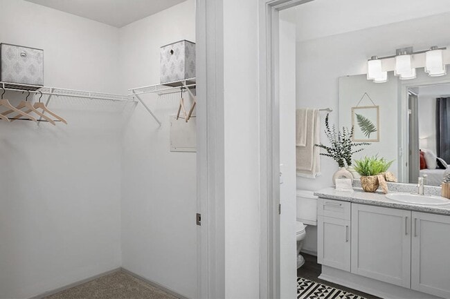 Main bathroom with upgraded lighting and countertops