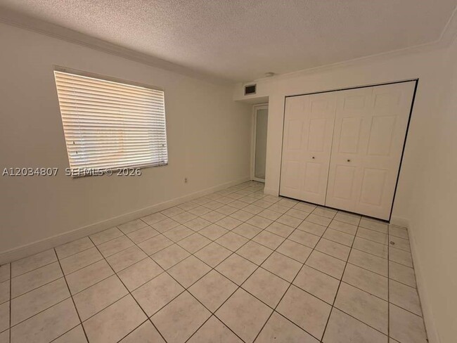 Building Photo - 9311 SW 4th St Unit 117B