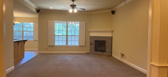 Photo - Wonderful brick home close to XNA boasting an upstairs and downstairs "primary" suite!