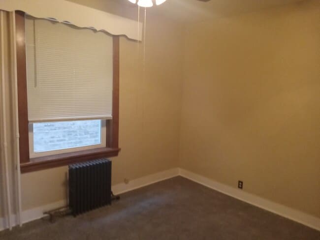 First bedroom - 5026 W Hutchinson St Unit 1