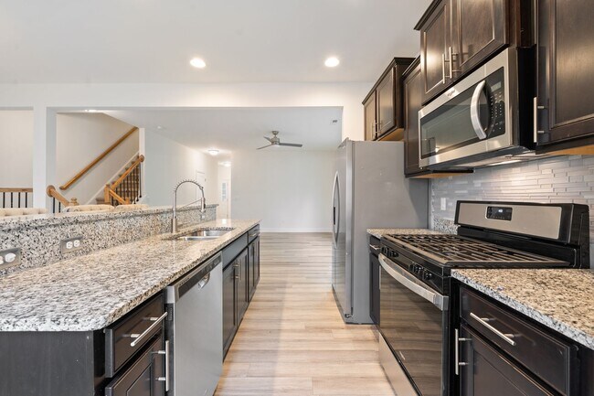 Photo - Stylish and Spacious 3 Bedroom, 2.5 Bathroom End-Unit Townhome w/ Garage!