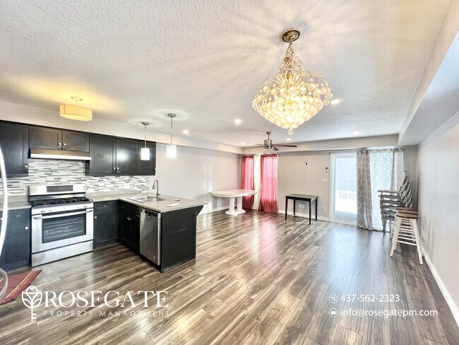 Photo - Spacious Main-Level Living with All Utilities Included in Woodstock Unit 1