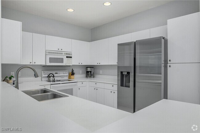 Building Photo - 3421 Pointe Creek Ct Unit 105 Rental