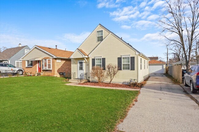 Photo - Charming 3-Bedroom Home with Detached Gara...