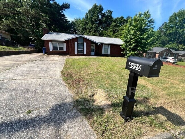 Building Photo - 6620 Cove Cir Rental