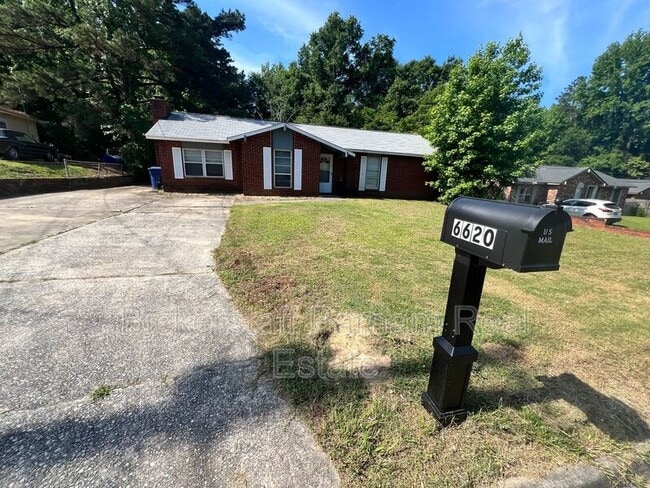 Building Photo - 6620 Cove Cir Rental