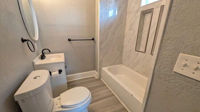 Photo - Come home to this great single family home with tons of charm and a beautiful yard