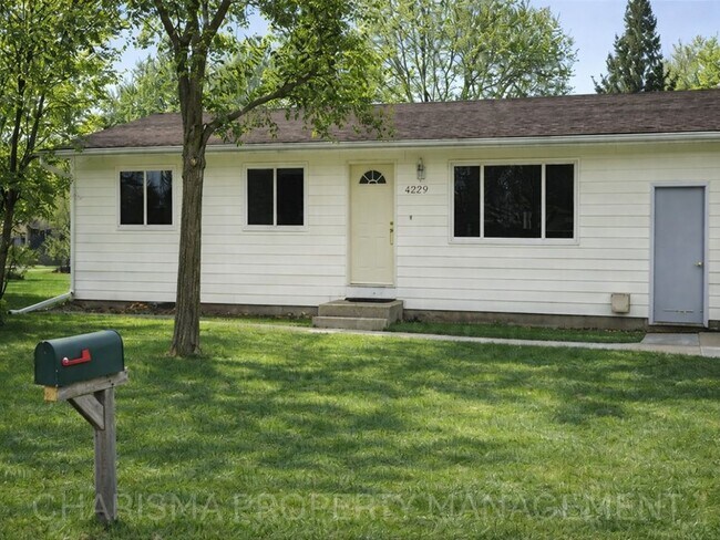 Photo - 4 BD, 2 BA - FENCED IN YARD, PRIVATE TRAILS, FINISHED UPPER AND LOWER LIVING AREAS, ATTACHED GARAGE!