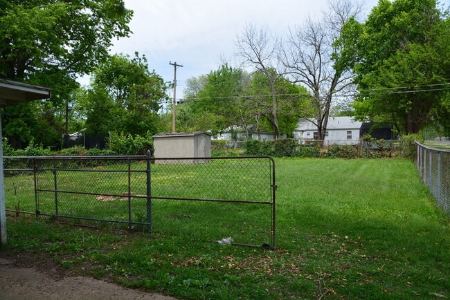 Photo - 3 Bedroom 1 Bath home with a Fenced back Yard!