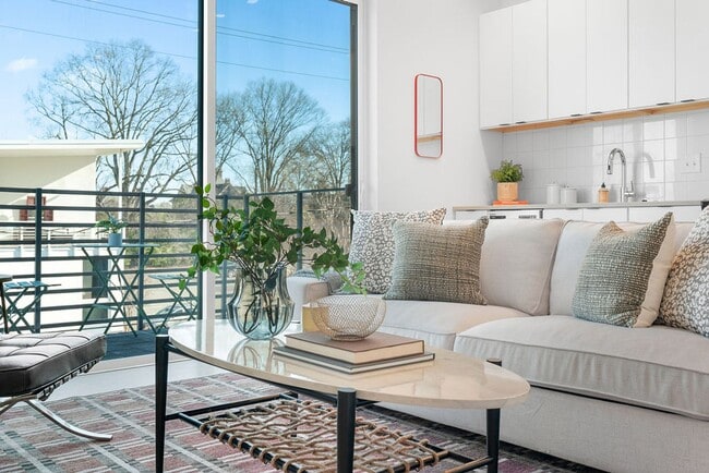 Photo - Modern downtown condo studio with private balcony & parking space.