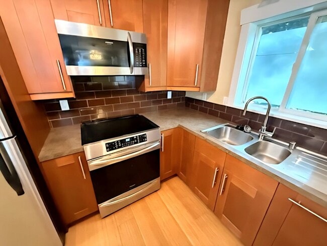 Building Photo - Modern West Seattle Condo | Beautiful Two Bedroom with Private Balcony