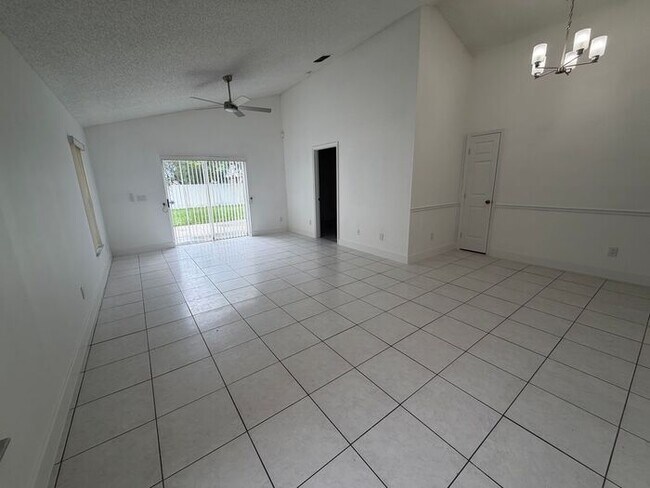 3 Bedroom, 2 Bathroom East Orlando Home with Garage & Large Fenced Backyard!