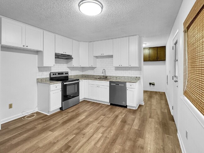 Photo - Charming 3-Bedroom Brick Ranch with Large ...