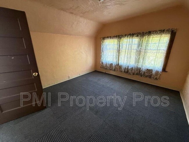 Building Photo - 3601 W Highland Blvd Unit 1