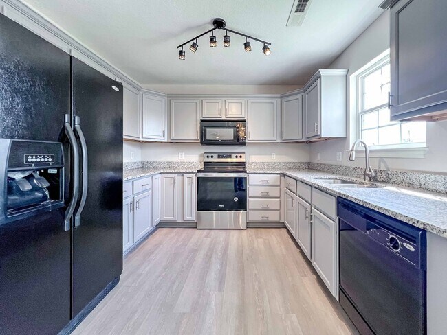 Photo - 3 Bed / 2.5 Bath Home with Fenced Backyard, Garage & Extra Storage