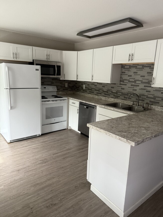 Building Photo - 629 E 8th Ave Unit 2