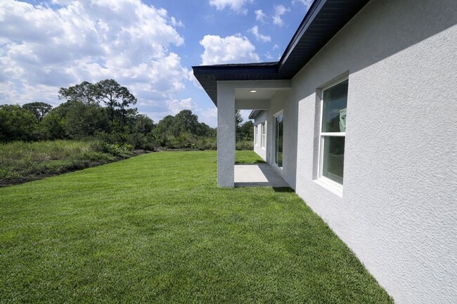 Building Photo - MODERN BRAND NEW RETREAT IN LEHIGH ACRES!