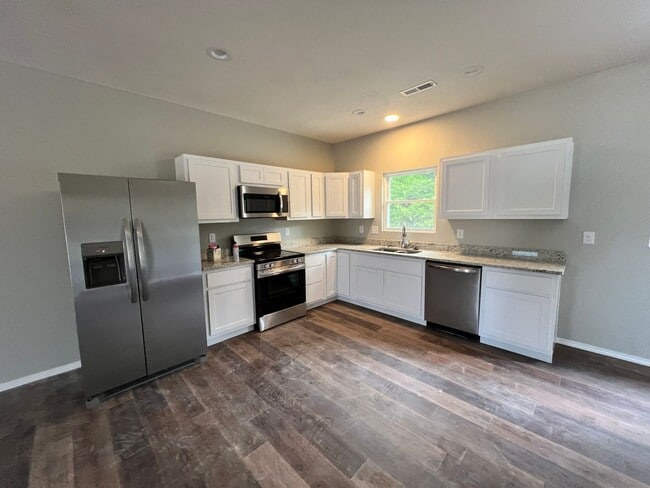Photo - 3 bedroom 1 bath 2 car garage