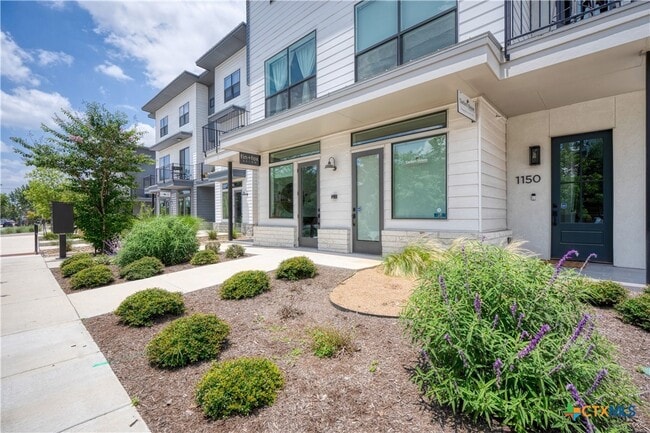 Building Photo - 1208 N Academy Ave Unit 3201