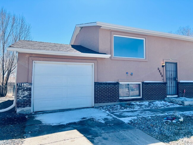 Photo - 4 Bed / 2 Bath Home with Finished Basement & Fenced Yard – Colorado Springs