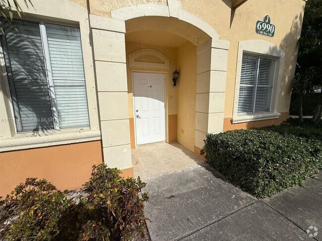 Building Photo - 6990 NW 177th St Unit J100 Rental