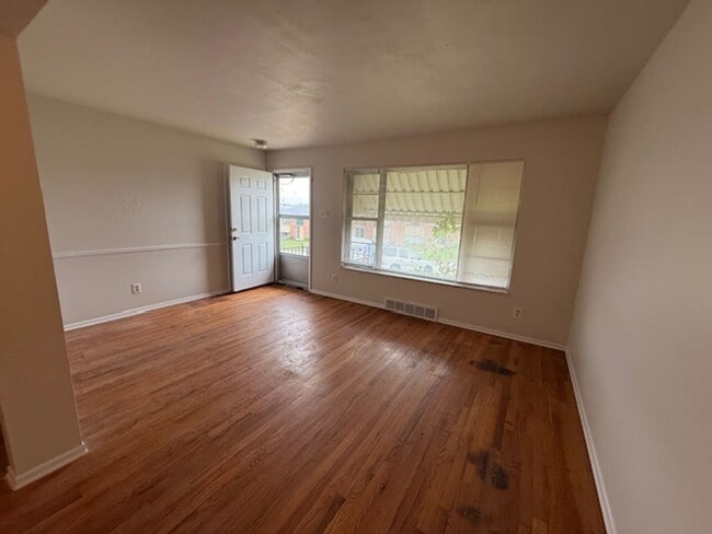 Photo - Charming 2-Bedroom Duplex with Modern Upda...