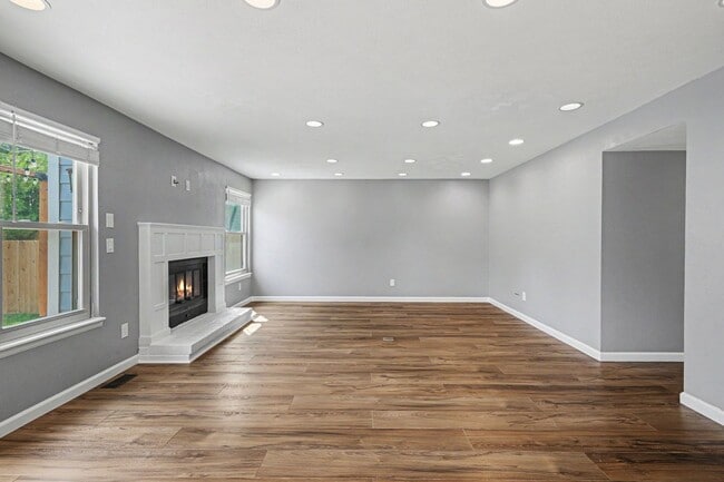 Photo - Updated 4BR Corner Lot Home with Finished Basement & 2-Car Garage