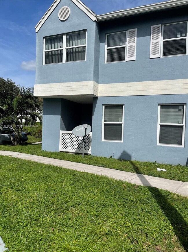 Building Photo - 17565 NW 67th Pl Unit A8 Rental
