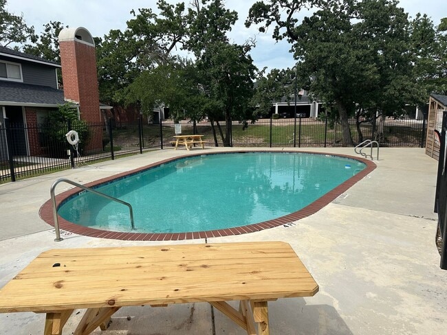 Photo - College Station - 2 bedroom / 1.5 bath Condo - 2 story with covered parking - Pool in your front ... Unit 52