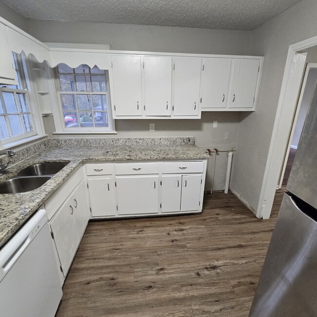 Photo - Full brick 3 bedroom, 1 and half bath home with screened in side porch, and an attic for extra st...