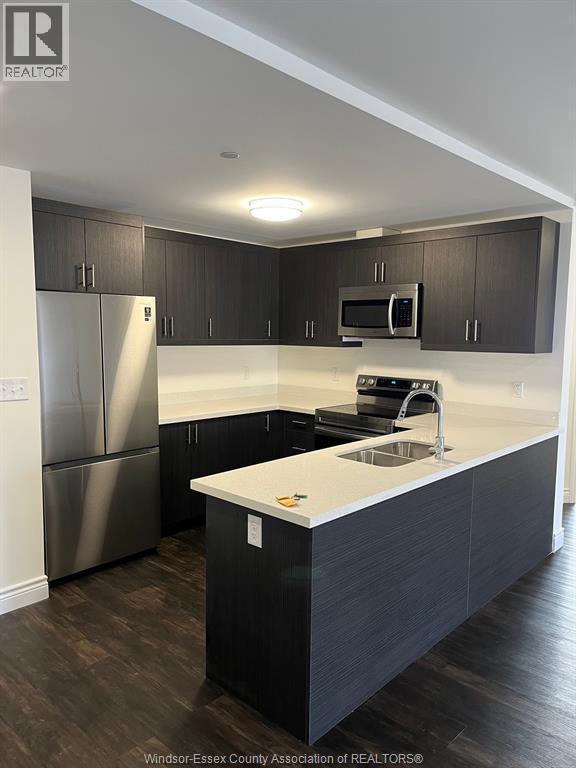 Photo - 1489 Banwell Rd Unité 427